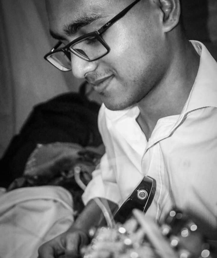 Abrar at MCC with guitar